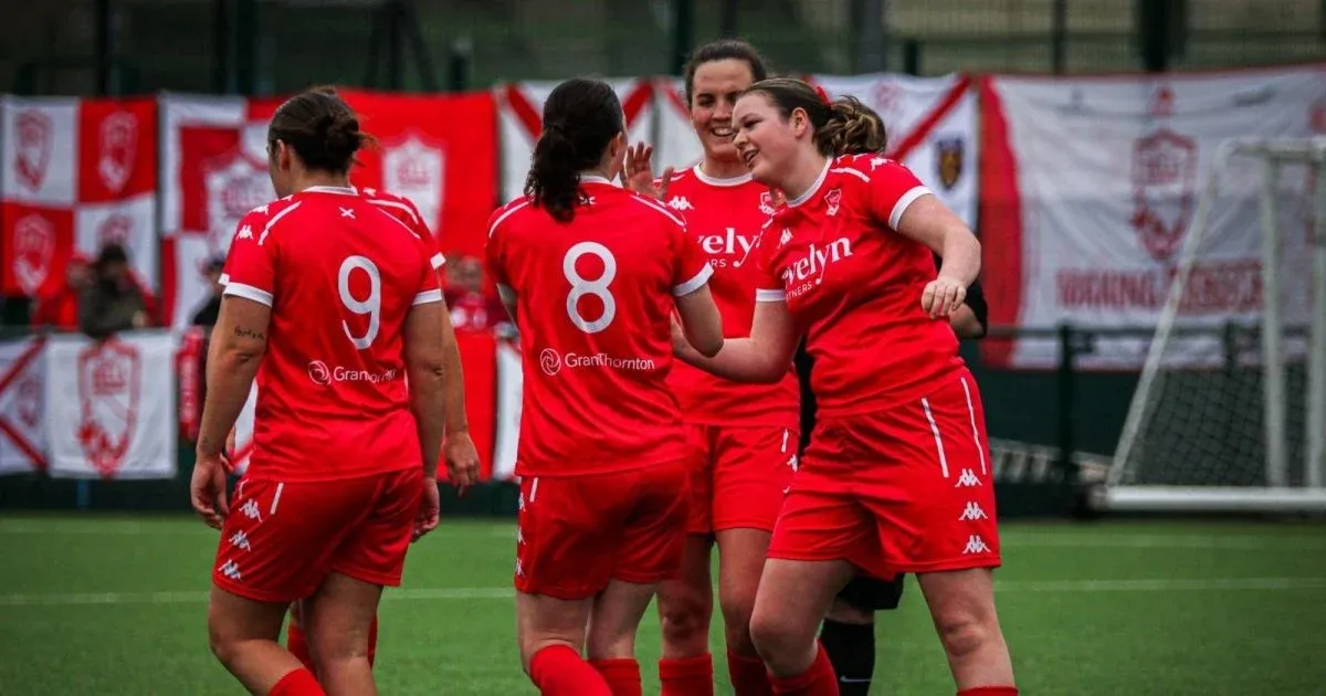 Jersey Bulls women celebrating together after a goal