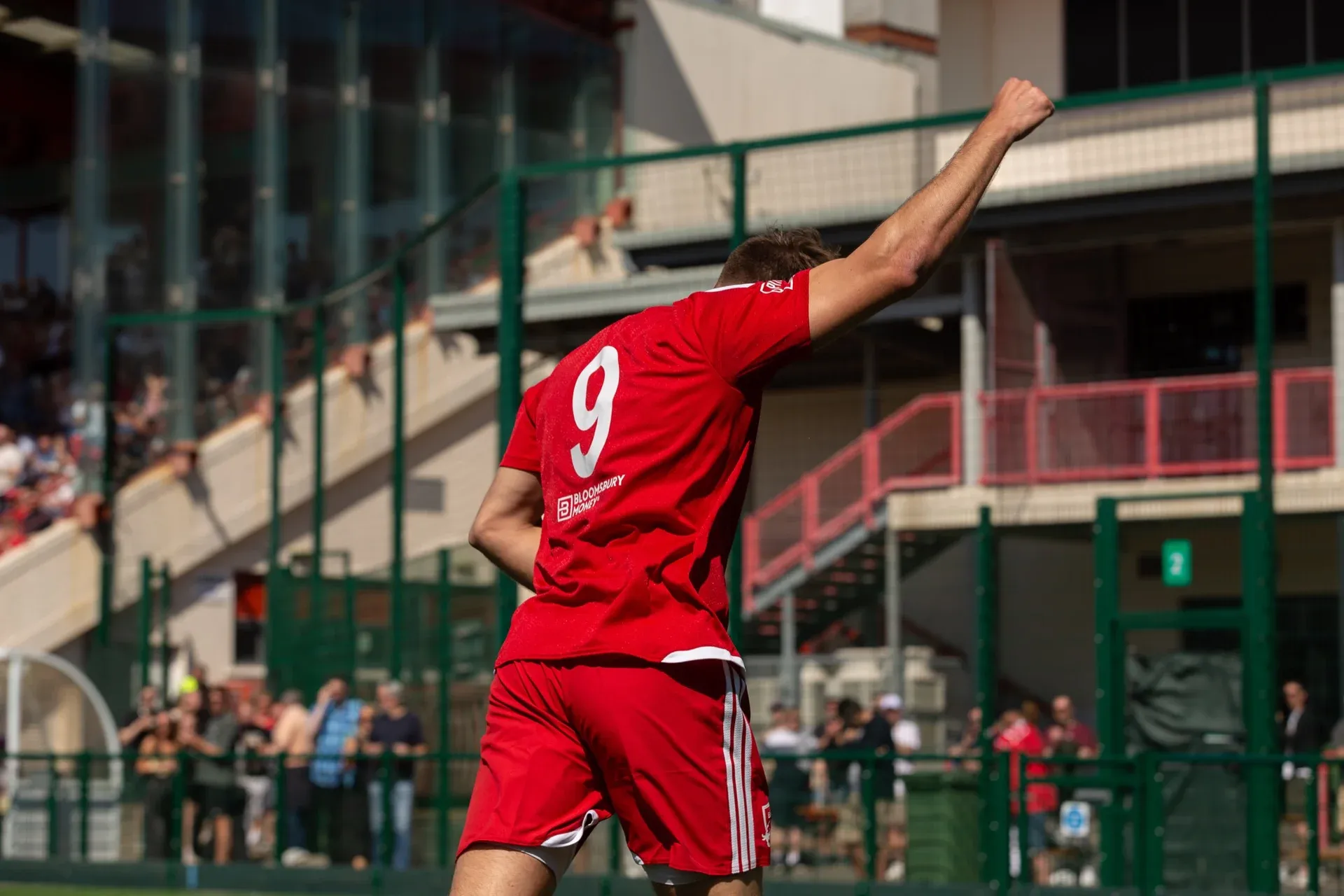 A Jersey Bulls player celebrating in front of the Springfield stand