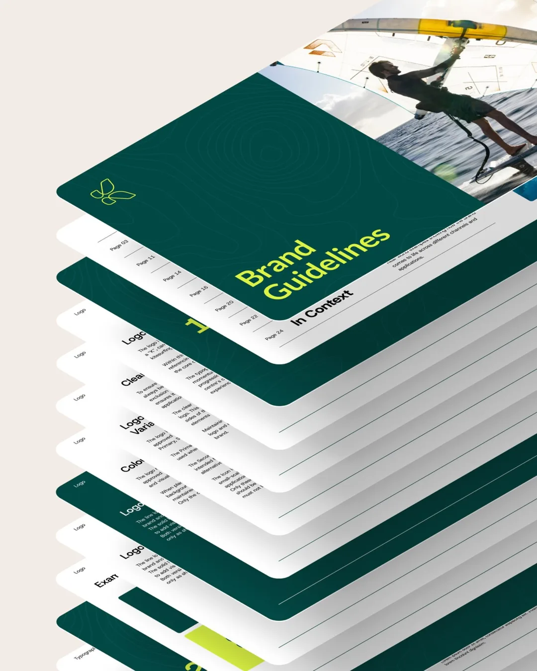 Stacked pages of The Kitesurf Centre brand guidelines